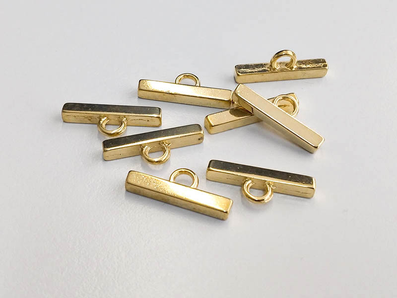 www.knopfparadies.de - 6429go - Stäbchenförmige, goldfarbene Knebelknöpfe
