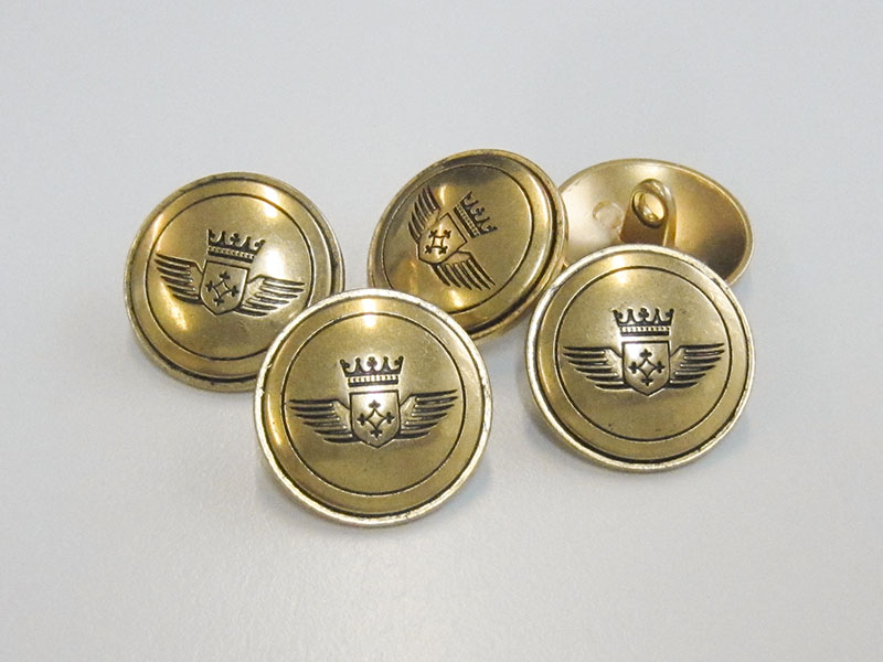 Altgoldfarbener Blazerknopf aus Metall