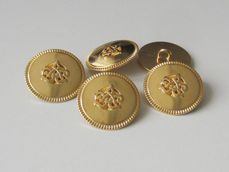 www.Knopfparadies.de - 3563gg - Beeindruckende gold glänzende Metallknöpfe mit Symbol