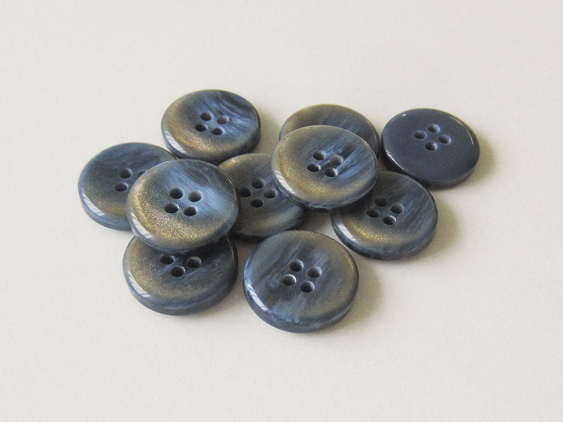 Blauer Vierloch Knopf aus Kunststoff mit goldfarbenen Glitzer