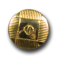 Goldener Metallknopf mit abstraktem Muster