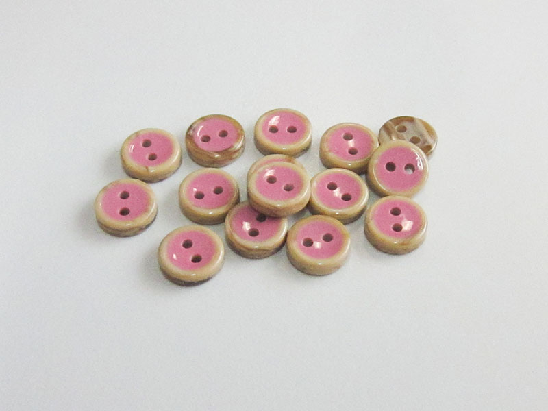 www.knopfparadies.de - 5104pi - Kleine Puppenknöpfe in pink und Holzopzik