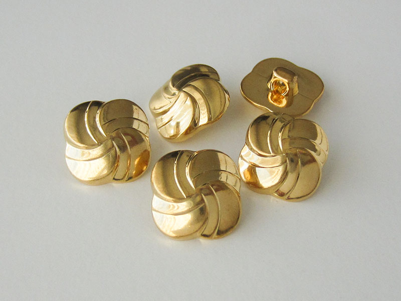 www.Knopfparadies.de - 1574go - Bezaubernde goldene Knöpfe aus Kunststoff wie Windrad oder Knoten