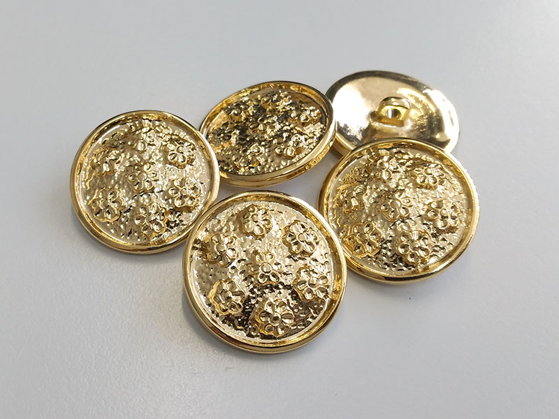 Goldfarbene Metallknöpfe