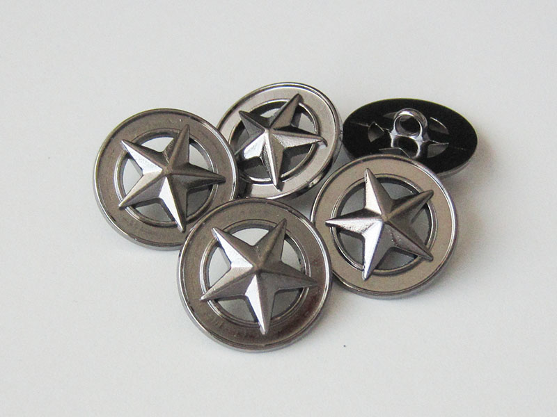 Dunkel chromfarbener Stern Knopf