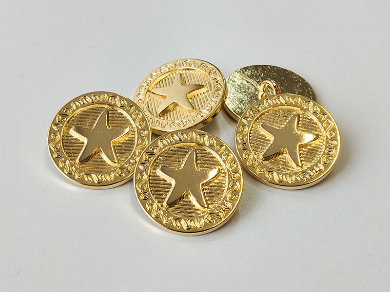 Wunderschöne, glänzend goldfarbene Metallknöpfe mit maritimen Motiv: Seestern