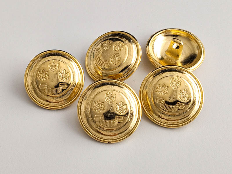 Goldfarbener Wappenknopf