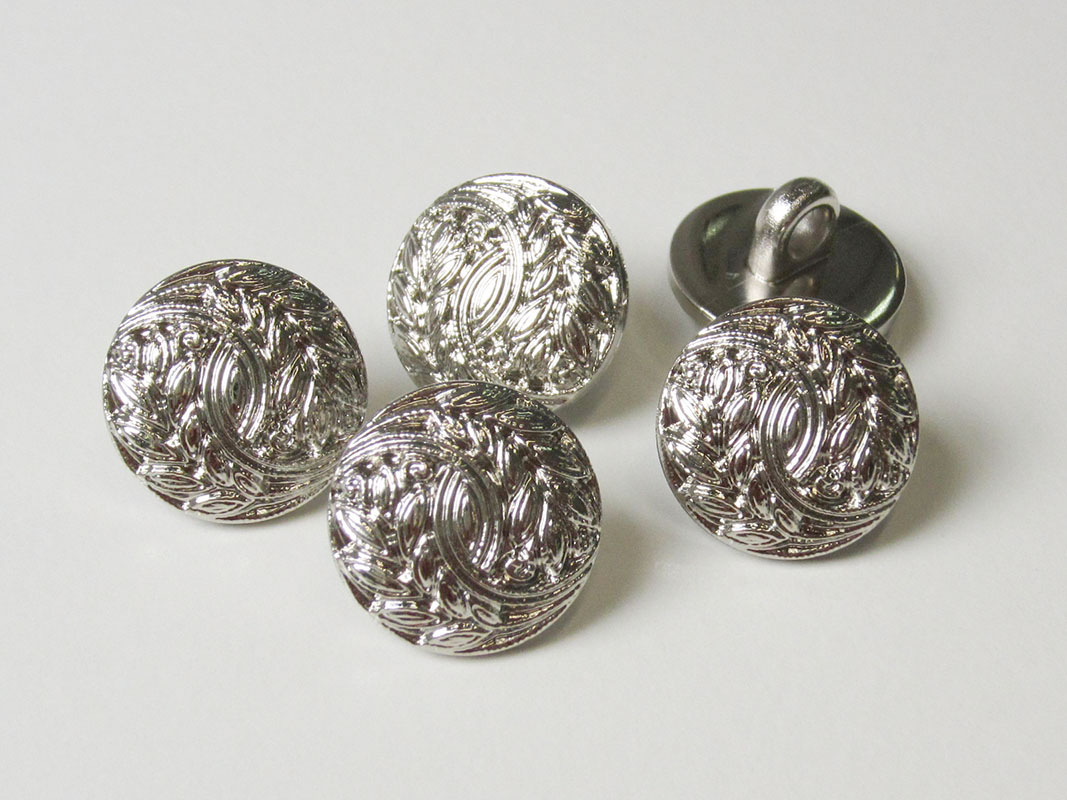 Kleiner Ösen Knopf in Metall Optik mit Ornament Muster
