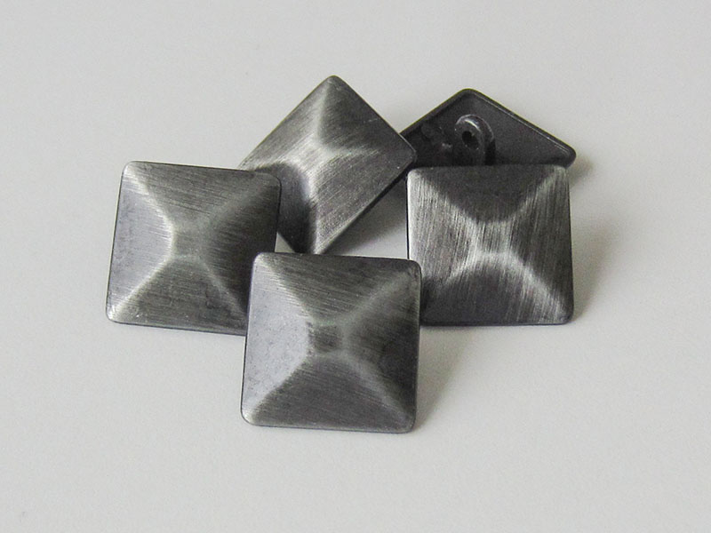 Interessanter quadratischer Knopf