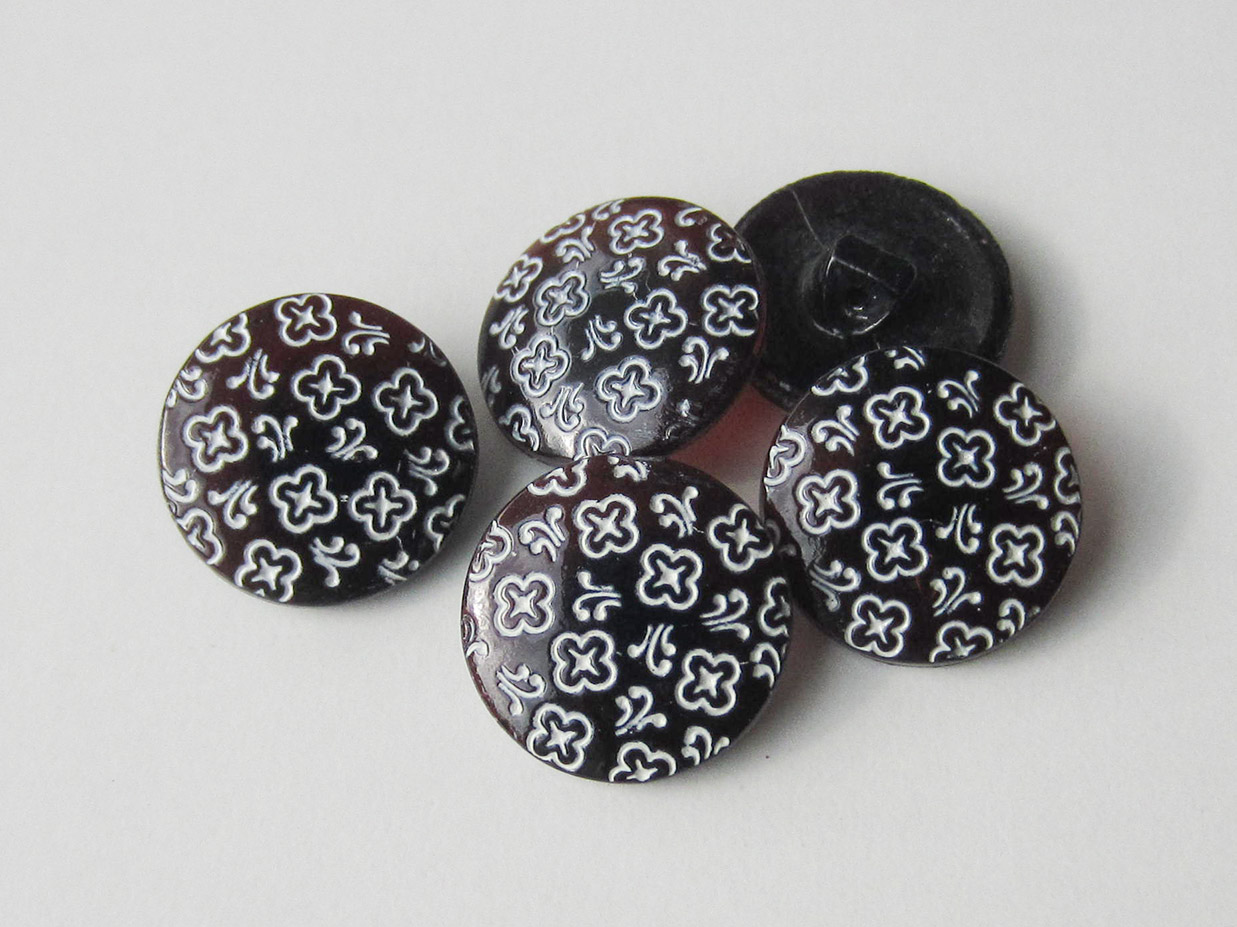 Glas Knopf in Braun mit weißem Blumen Muster