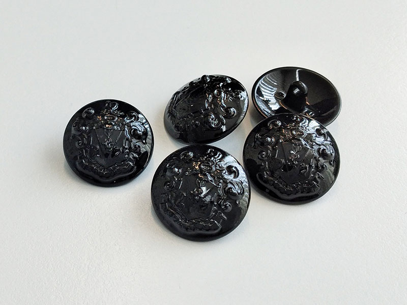 Metallknopf schwarz glänzend mit Wappenmotiv