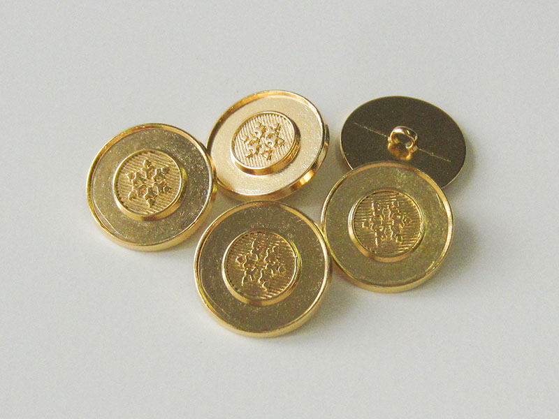 www.Knopfparadies.de - 3380gg - Günstigere gold glänzende Ösenknöpfe aus Metall mit Stern / Schneeflocke