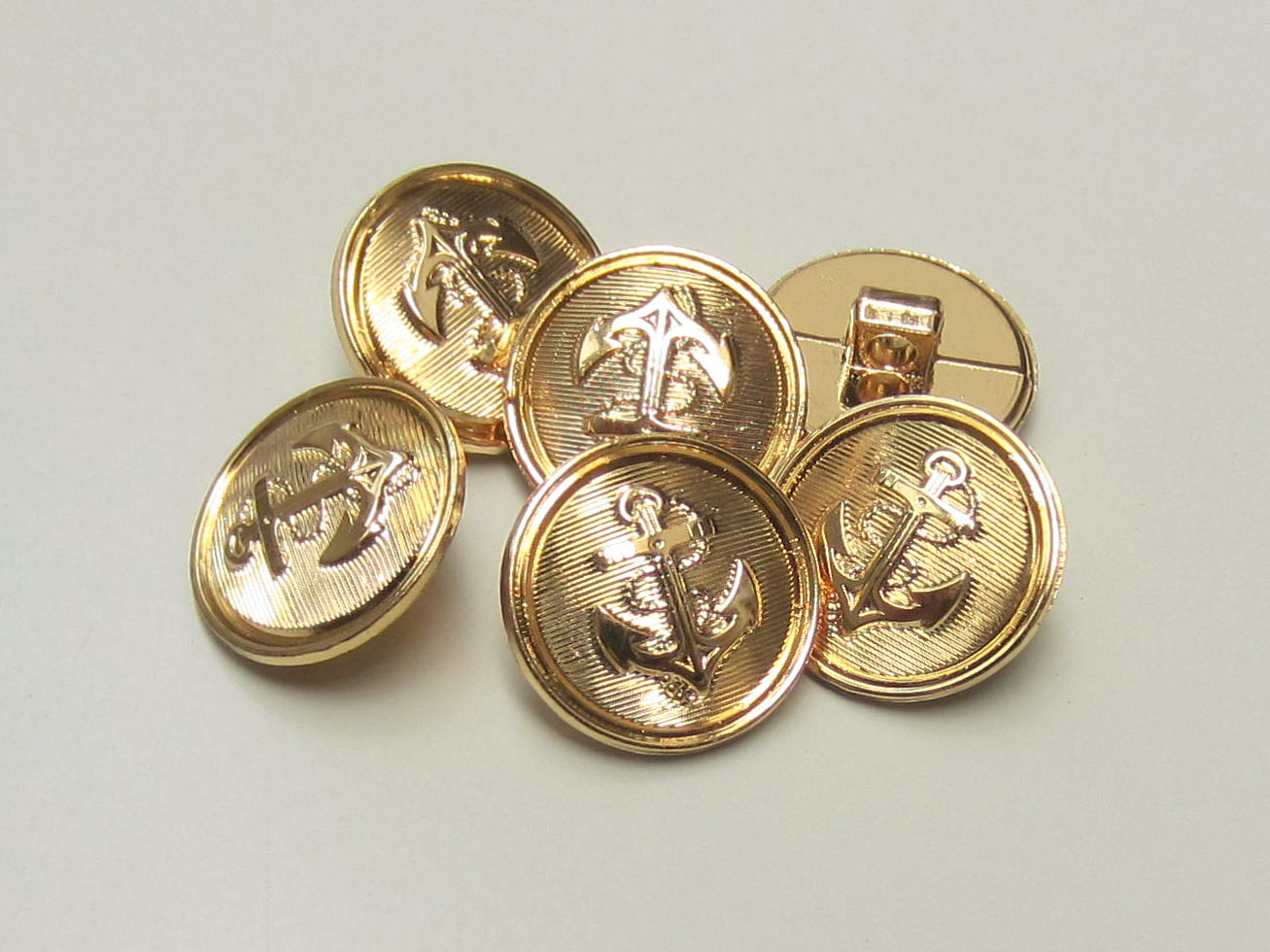 www.knopfparadies.de - z058g - Kunststoffknöpfe gold glänzend mit Motiv: Anker