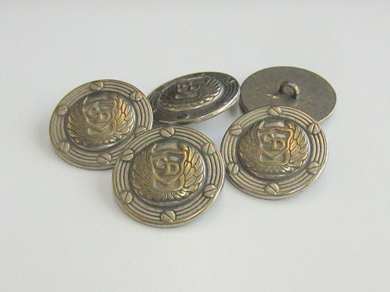 www.Knopfparadies.de - 4178bi - Günstigere Designerknöpfe aus Metall mit Schwingen in Silbe & Messing / B-WARE