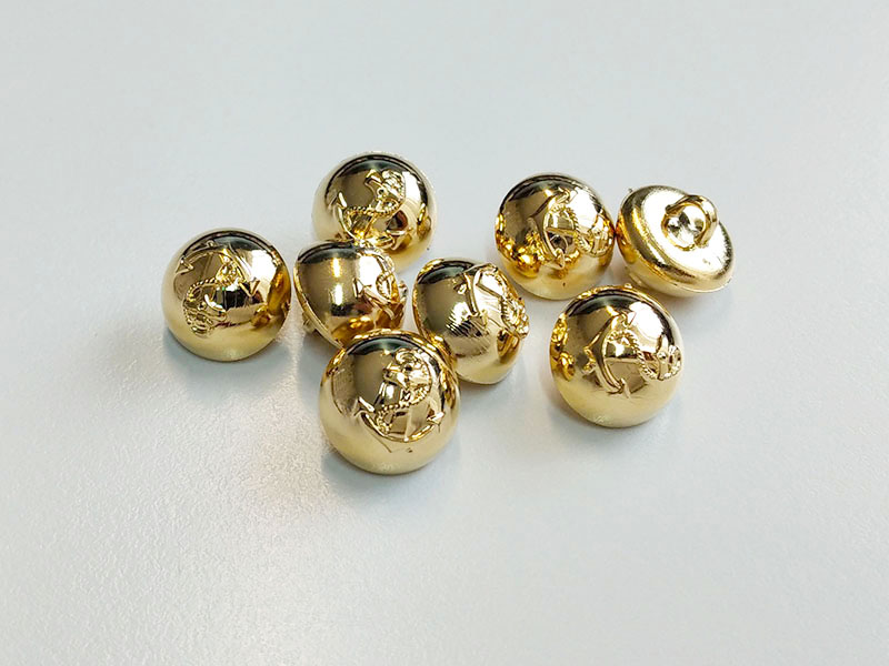 www.knopfparadies.de - 4540go - Leichte, glänzend goldfarbene Kunststoffknöpfe mit Anker