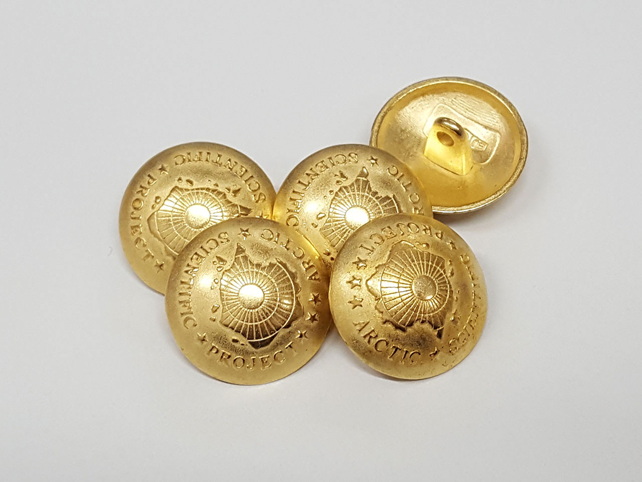 www.knopfparadies.de  - 0997go - Metallknöpfe mit Arktis Thema goldfarben mit Öse
