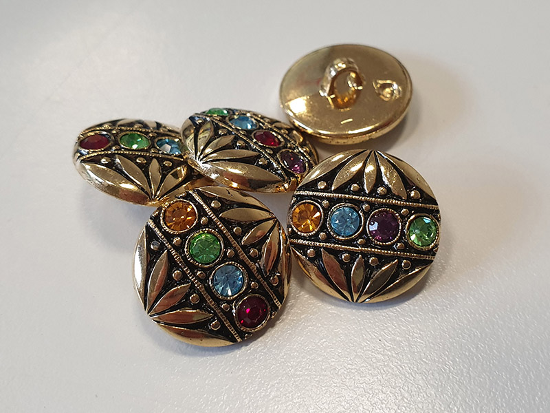 www.knopfparadies.de - d703go - Goldfarbene Kunststoffknöpfe mit 4 Glitzersteinchen