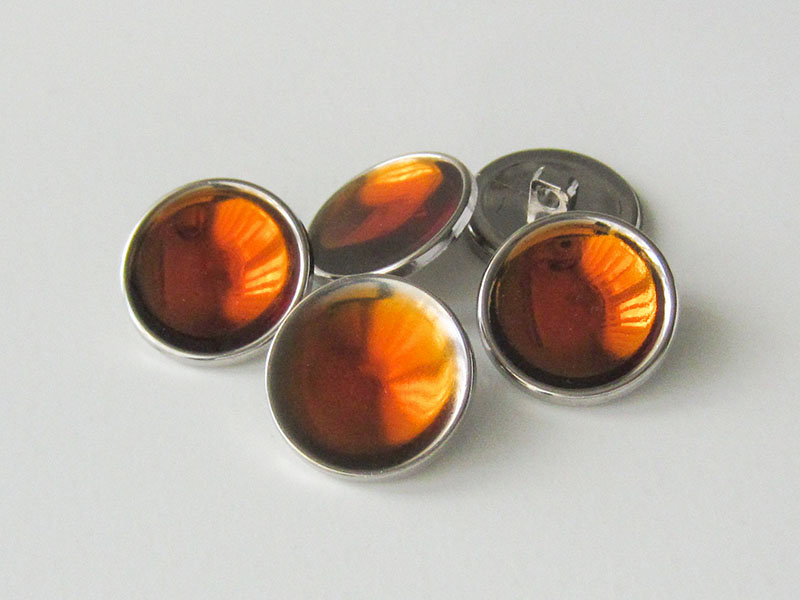 www.Knopfparadies.de - 4079or - Kreative silberne Ösenknöpfe aus Kunststoff mit orangefarbener Füllung