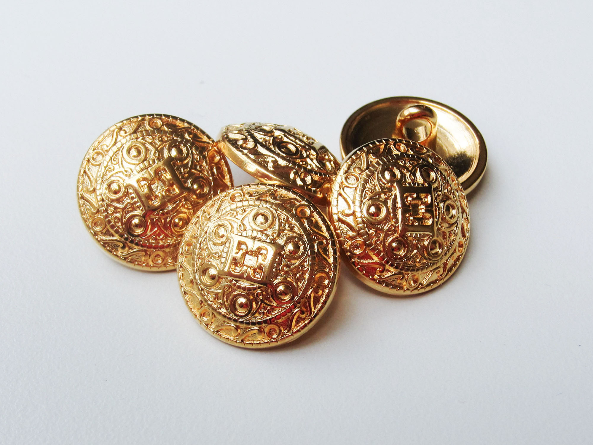 Edle, goldfarbene Designer Knöpfe aus Metall