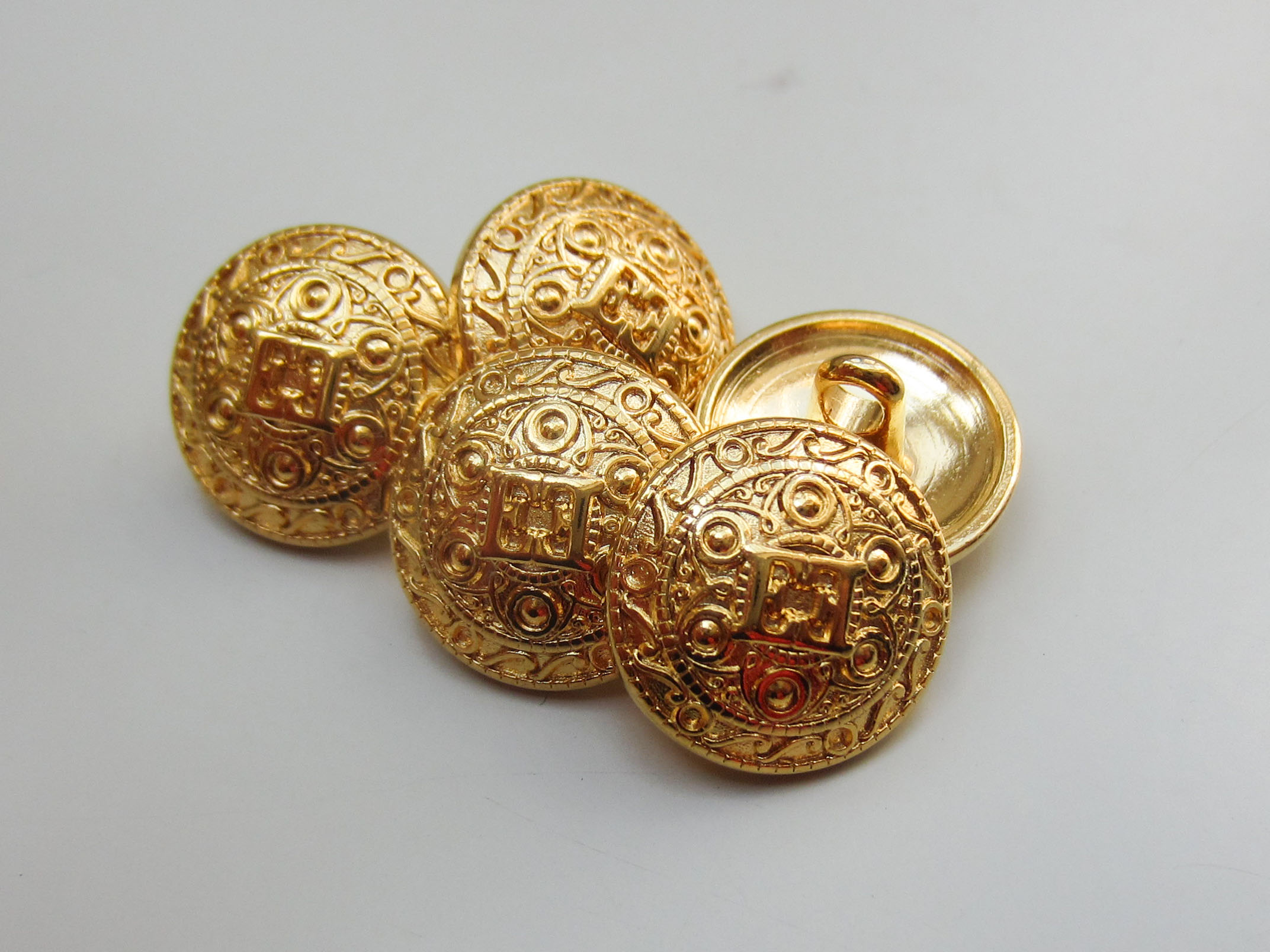 Edle, goldfarbene Designer Knöpfe aus Metall