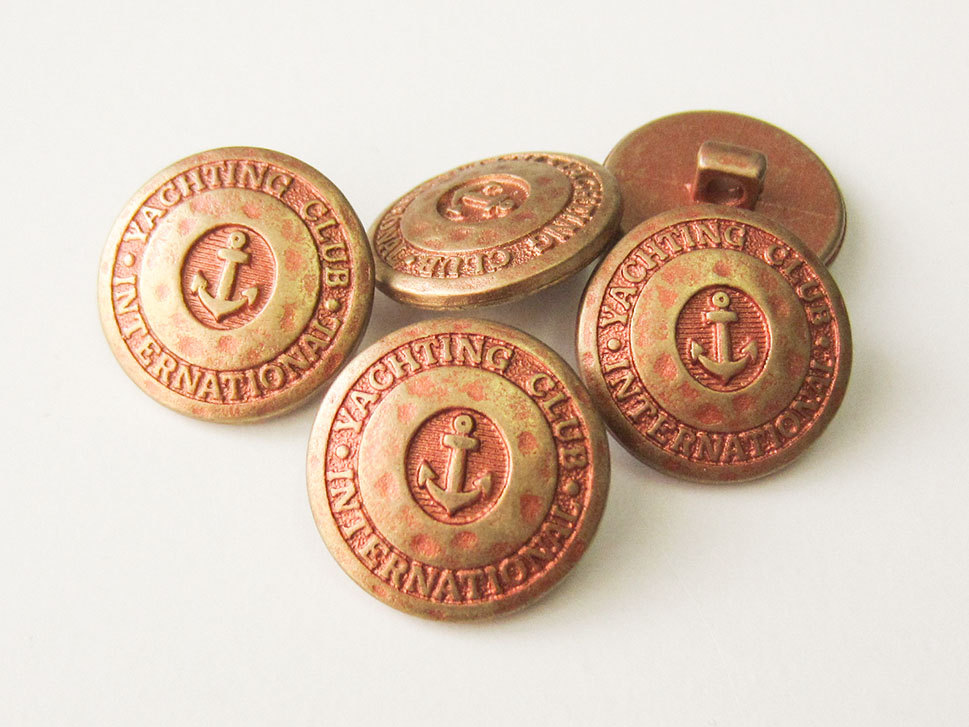 Interessanter Ankerknopf in Gold-Terracotta-Look
