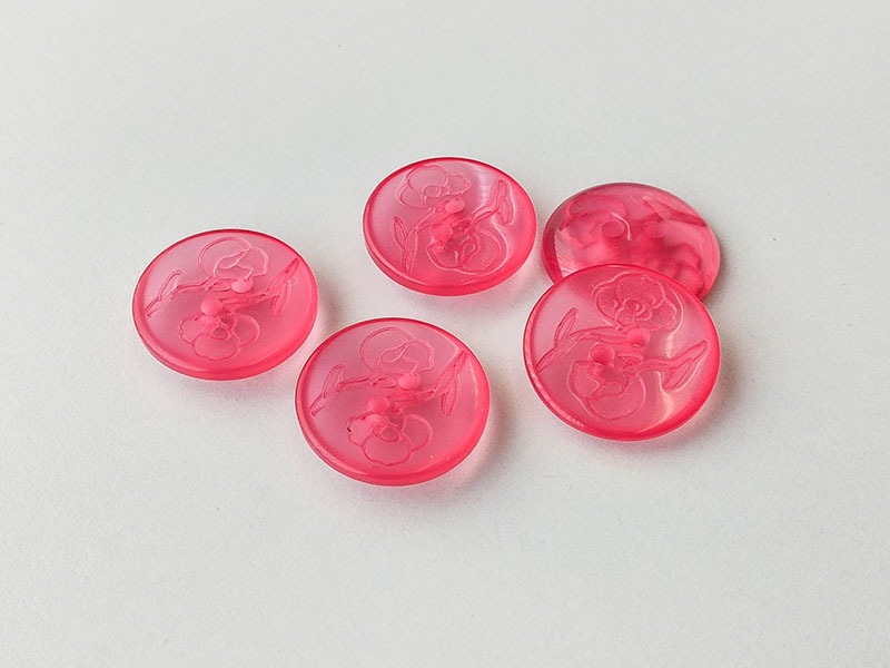 www.knopfparadies.de - 1001pi - Transparent pinke Kunststoffknöpfe mit Blütenmotiv