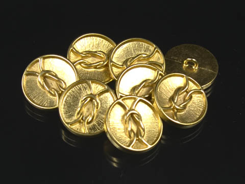 Goldfarbene Designerknöpfe aus Metall