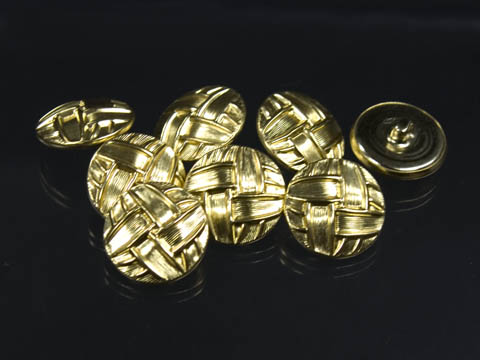 Goldfarbene Ösenknöpfe mit Flechtmuster