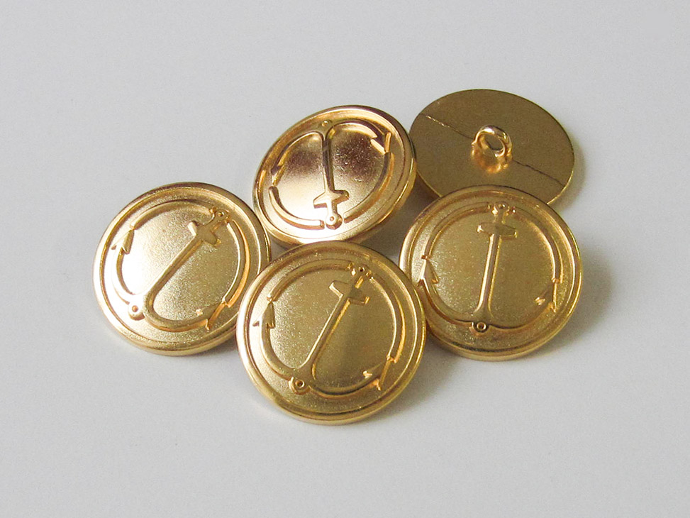 Goldfarbener maritimer Metall-Knopf mit Anker