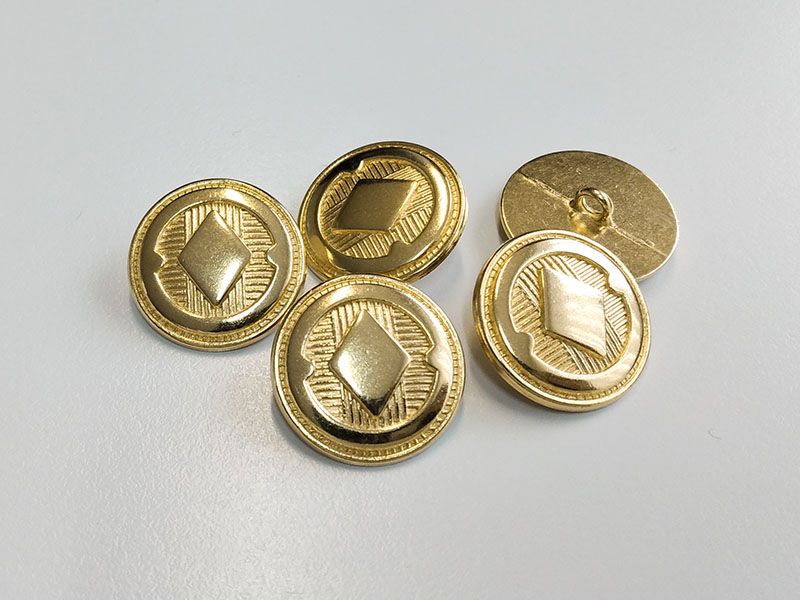 Sehr edel wirkender goldfarbener Ösenknopf