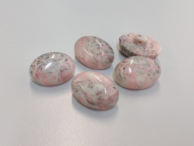 www.knopfparadies.de - 4537ps - Ovale Kunststoffknöpfe, pink und weiß und schwarz marmoriert
