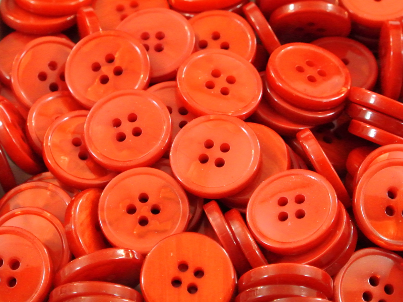 Orange roter Knopf m. Perlmuttschimmer
