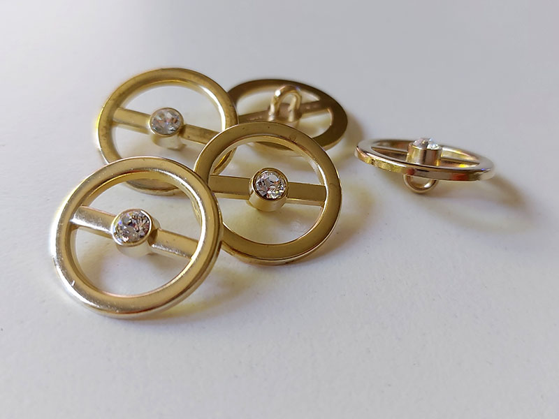 Attraktive minimalistische goldfarbene Designerknöpfe - Metall - mit Glitzerstein