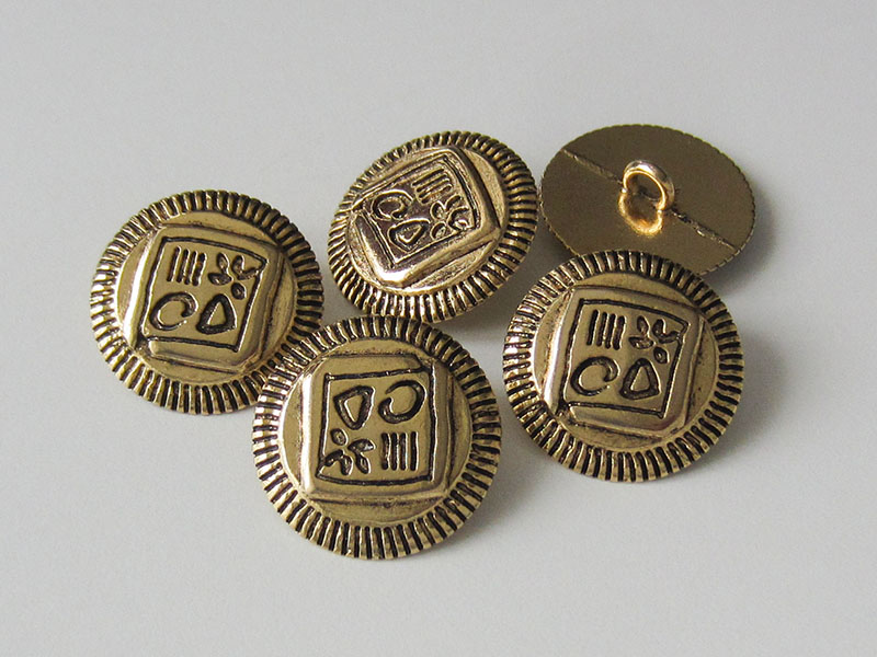 www.Knopfparadies.de - 0851ag - Phantasievolle goldene Metallknöpfe mit geschwärztem Viereck & Symbolen