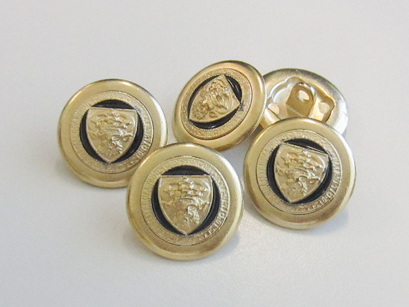 Gold-schwarzer Blazerknopf