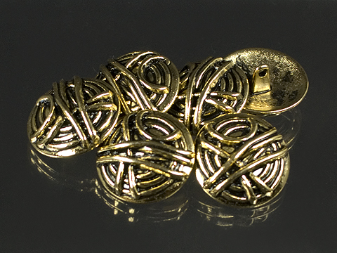 Altgoldfarbener Knopf in Wickel-Design