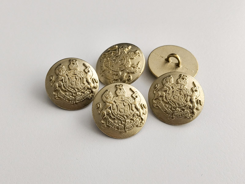 Gold-messingfarbener Wappenknopf
