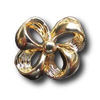 Glänzend goldfarbener Knopf wie festliche Schleife Glänzend goldfarbener Knopf wie festliche Schleife