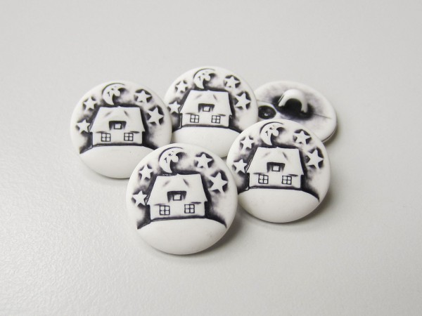 Hübsche schwarz-weiße Kinderknöpfe