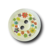 Süßer creme weißer Knopf mit winzigen bunten Blüten Süßer creme weißer Knopf mit winzigen bunten Blüten